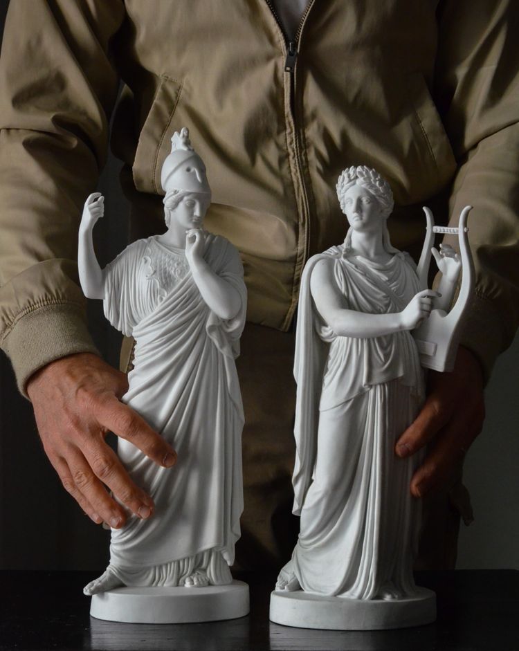 Pair of neoclassical biscuit statuettes