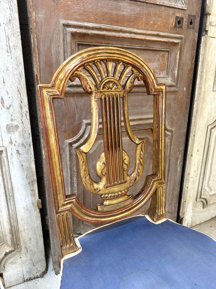 Pair of Louis XVI style chairs in gilded wood