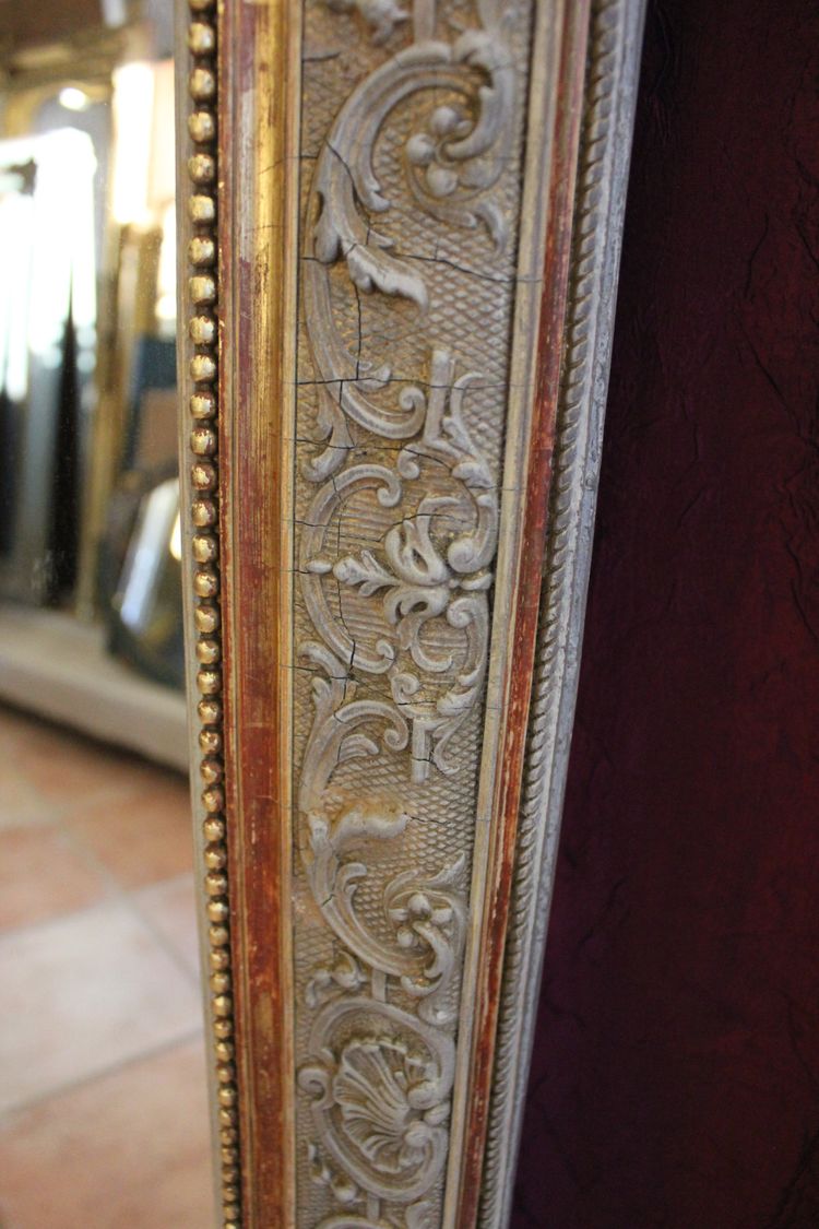 107 x 173 cm Napoleon III pearled mirror, Louis XV-style pediment décor, gold leaf and patina