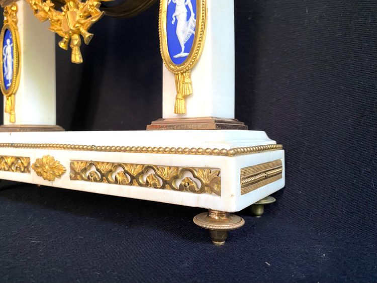 Marble and gild bronze portico clock circa 1780