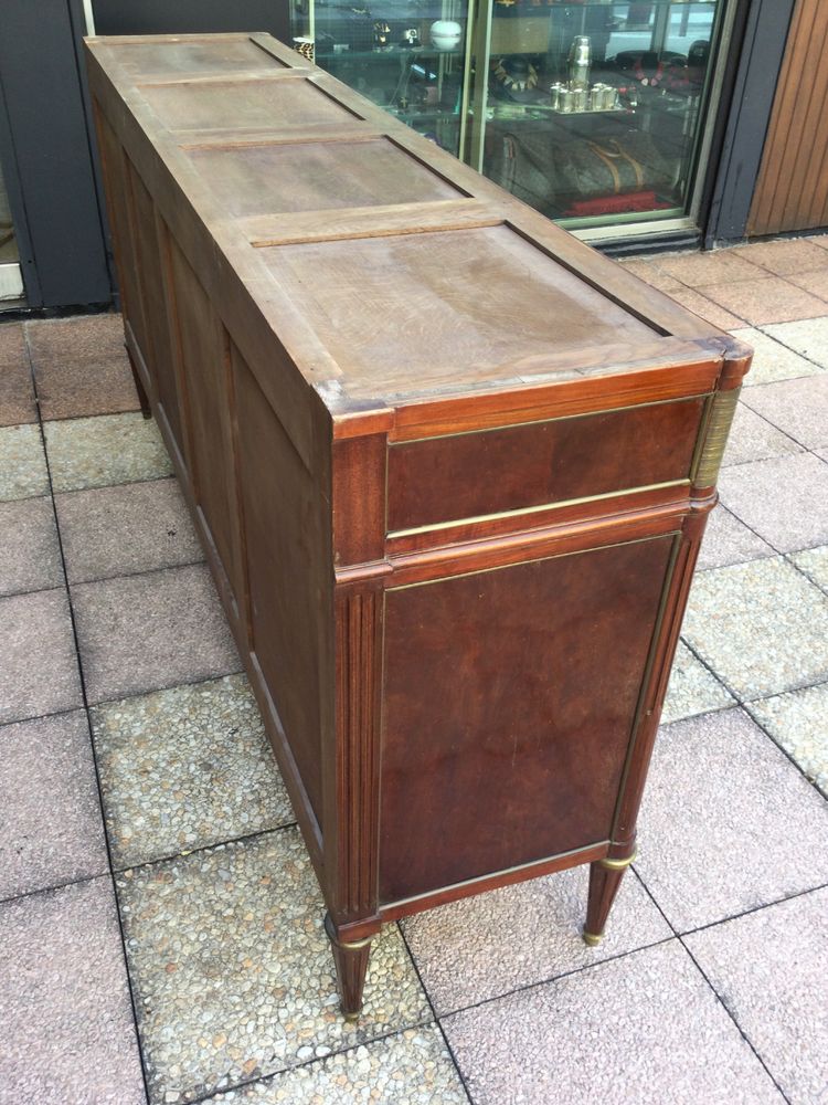 A Louis XVI-style enfilade sideboard in varnished mahogany