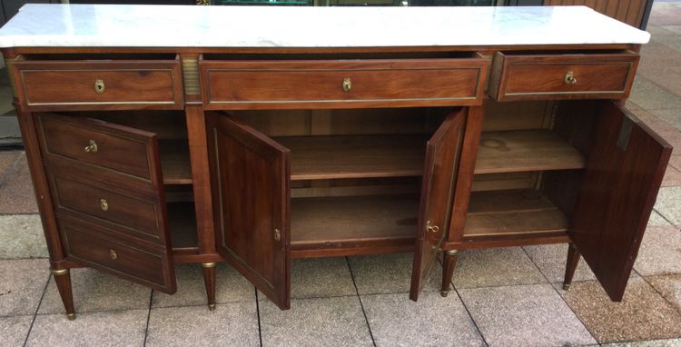 A Louis XVI-style enfilade sideboard in varnished mahogany