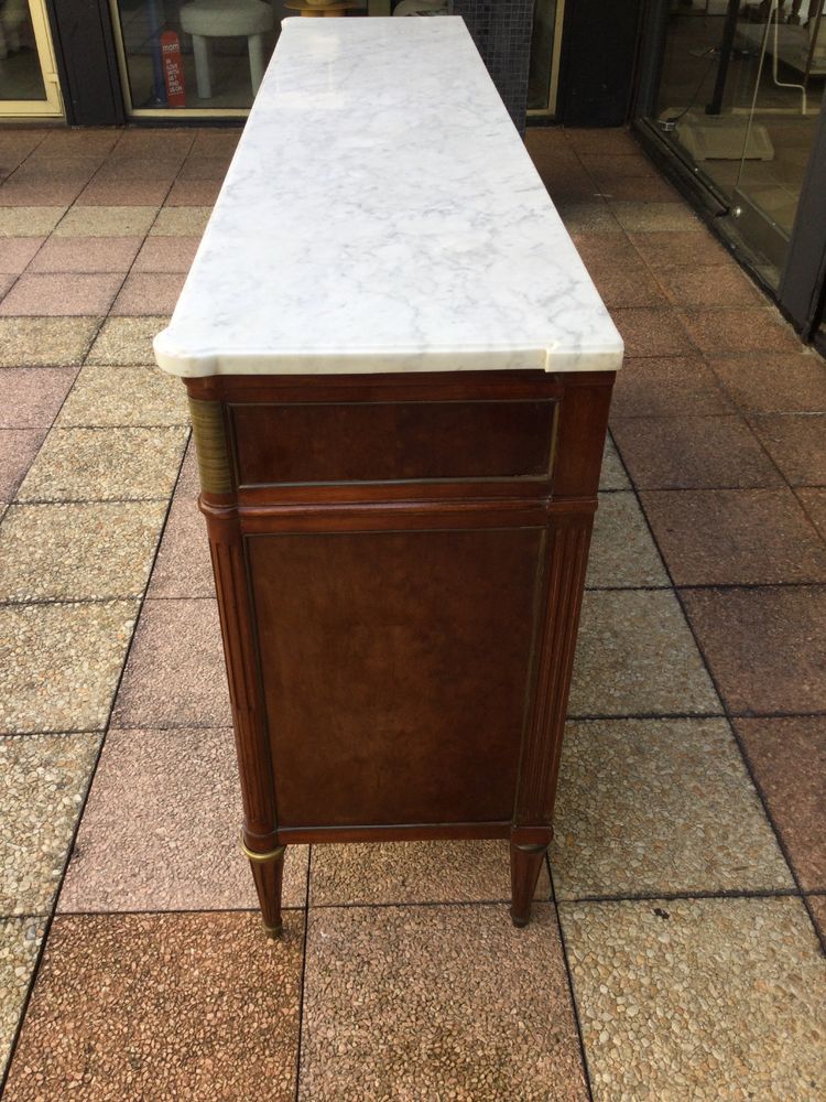 A Louis XVI-style enfilade sideboard in varnished mahogany
