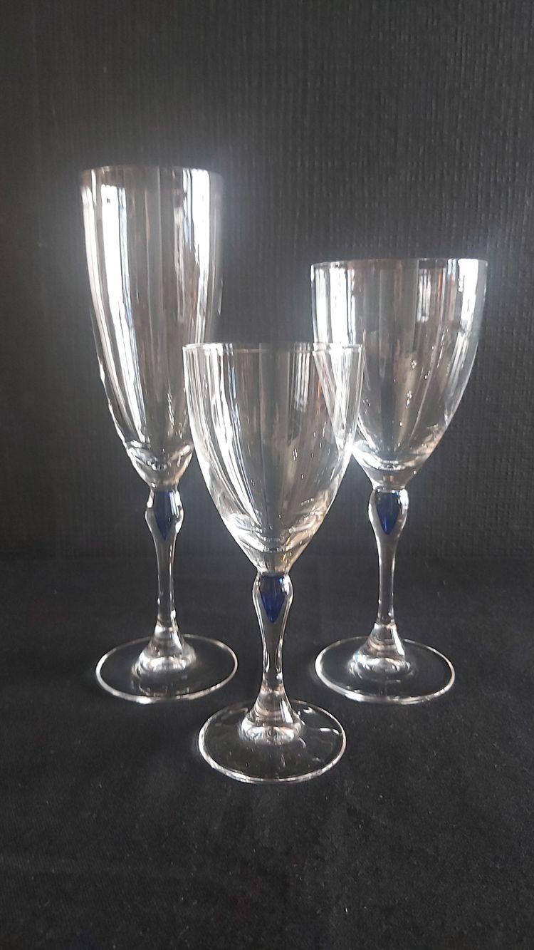 Set of crystal glasses, blue drop at the top of the leg.