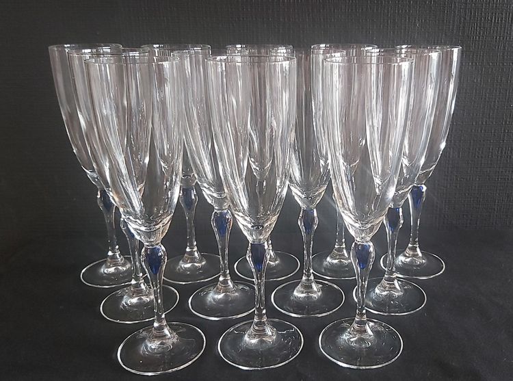 Set of crystal glasses, blue drop at the top of the leg.