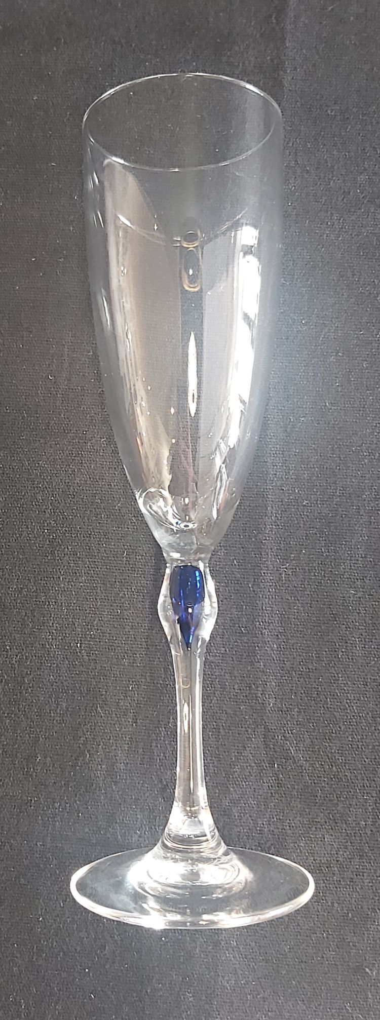Set of crystal glasses, blue drop at the top of the leg.