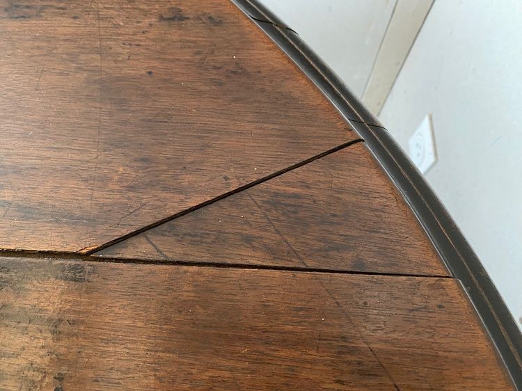 Grande tavolo Napoleone III in legno annerito