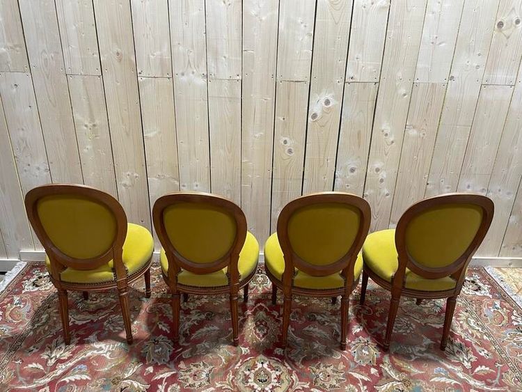 Suite di 4 sedie in stile giallo Louis XVI giallo