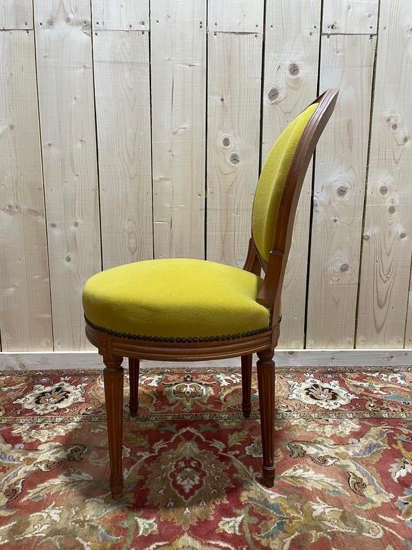 Suite di 4 sedie in stile giallo Louis XVI giallo