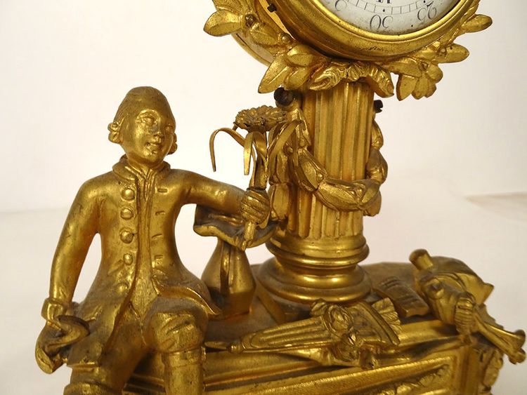 Small ormolu gardener clock with watering can Berthoud Paris 19th century