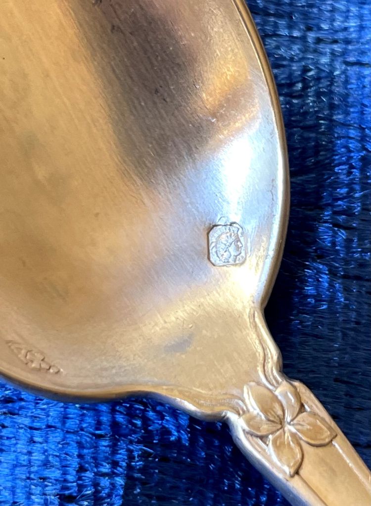 12 art nouveau teaspoons.