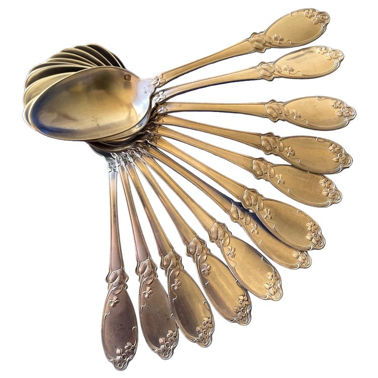 12 art nouveau teaspoons.