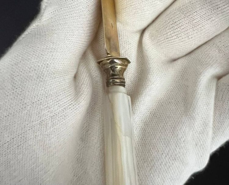 Set of 12 Minerve silver knives B.Lorillon (Paris,1854-1857), monogrammed mother-of-pearl handles