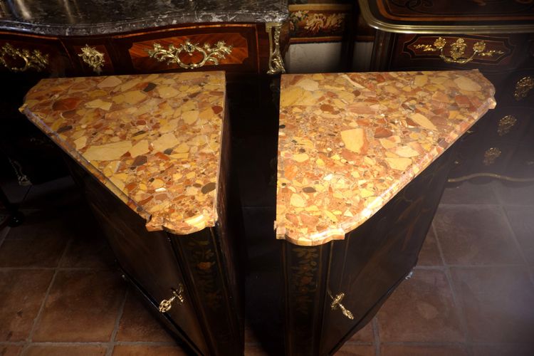 Pair of European varnish corner blocks stamped Foureau