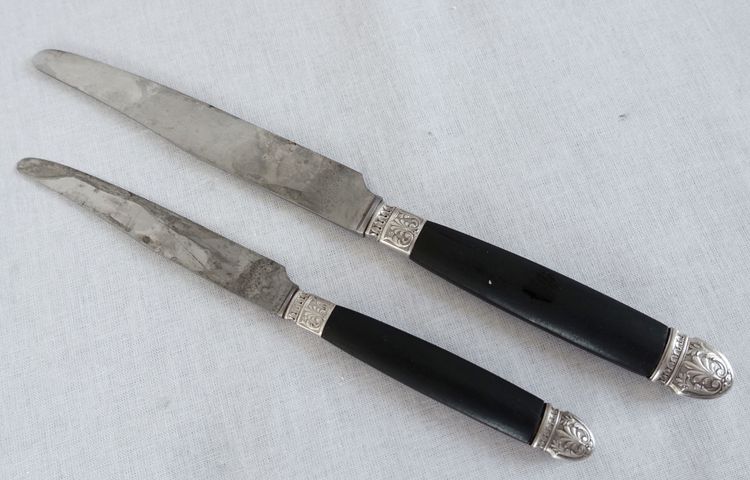 Empire style cabinet of ebony knives, solid silver ferrules and bases - 24 pieces