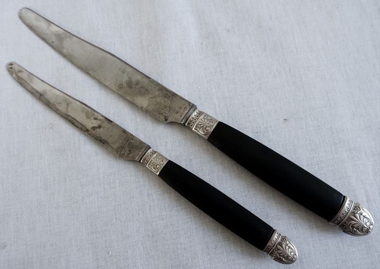 Empire style cabinet of ebony knives, solid silver ferrules and bases - 24 pieces