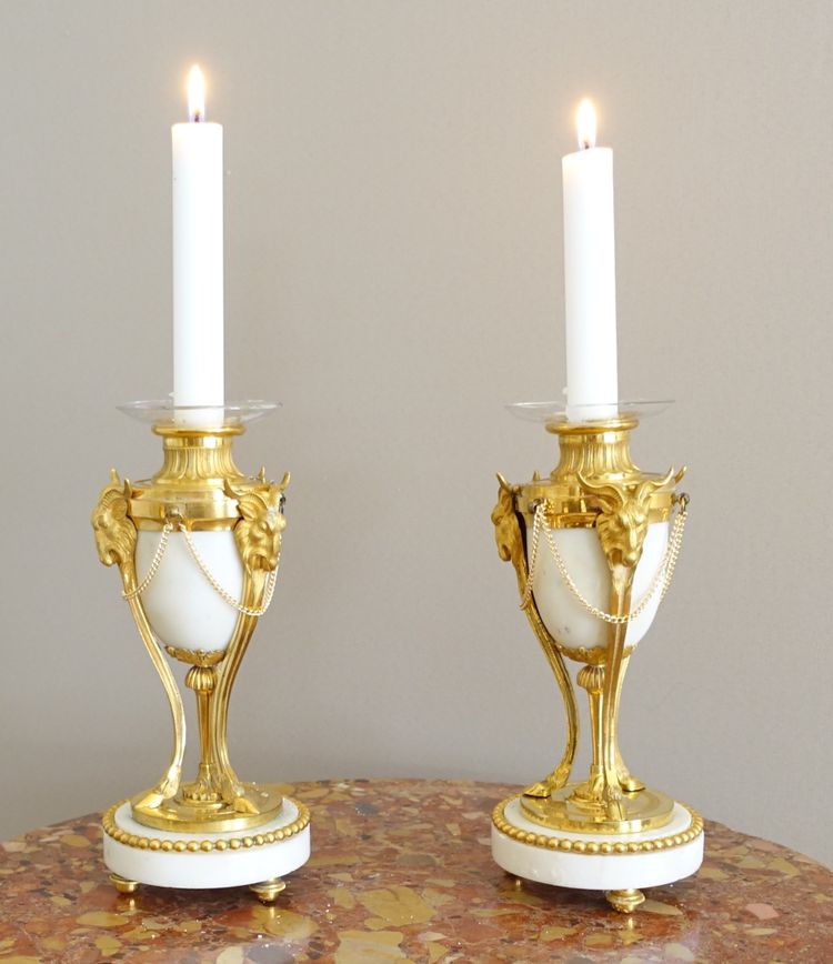 Pair of Louis XVI style marble ormolu cassolettes with upside-down candlesticks