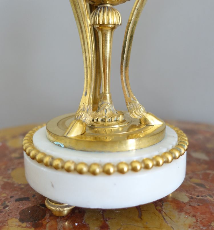 Pair of Louis XVI style marble ormolu cassolettes with upside-down candlesticks
