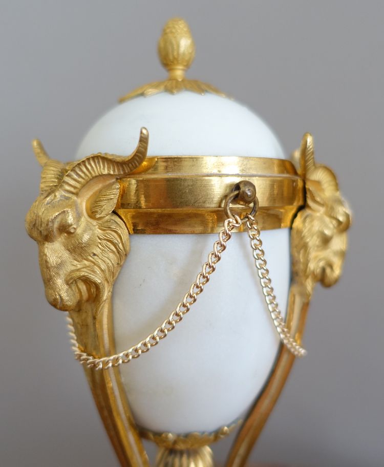 Pair of Louis XVI style marble ormolu cassolettes with upside-down candlesticks