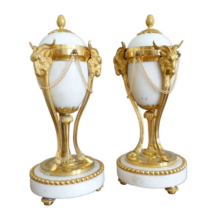 Pair of Louis XVI style marble ormolu cassolettes with upside-down candlesticks