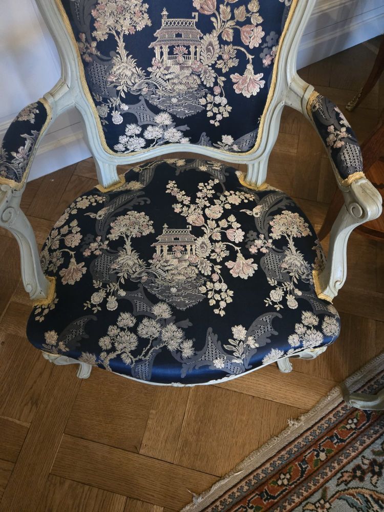 Pair of Louis XV period cabriolet armchairs in lacquered beech.