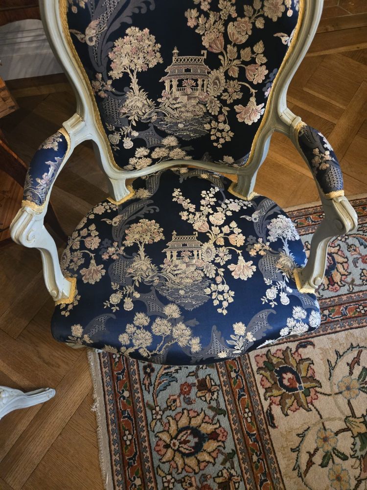 Pair of Louis XV period cabriolet armchairs in lacquered beech.