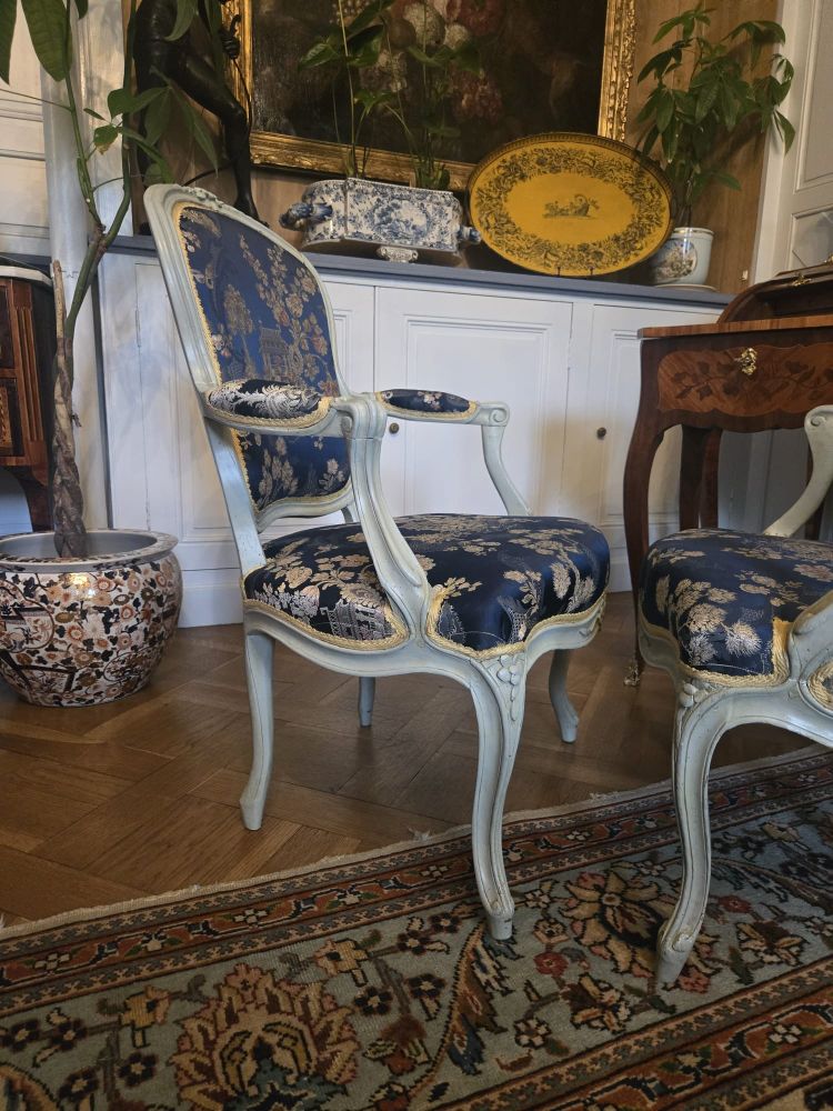 Pair of Louis XV period cabriolet armchairs in lacquered beech.