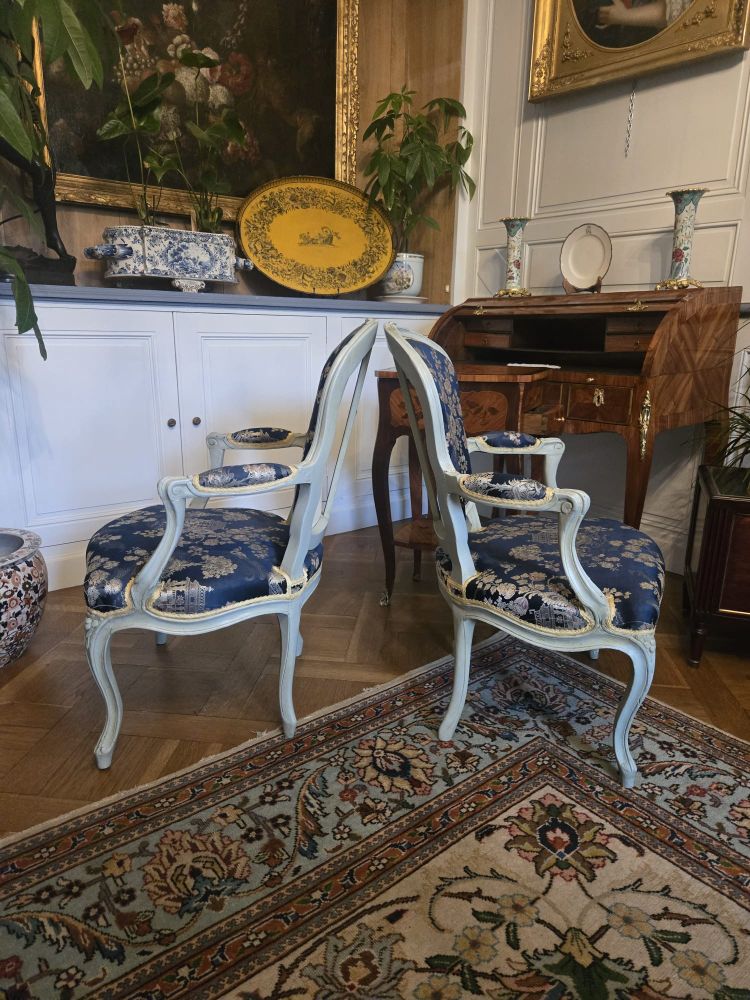 Pair of Louis XV period cabriolet armchairs in lacquered beech.