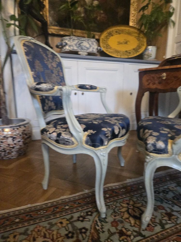 Pair of Louis XV period cabriolet armchairs in lacquered beech.