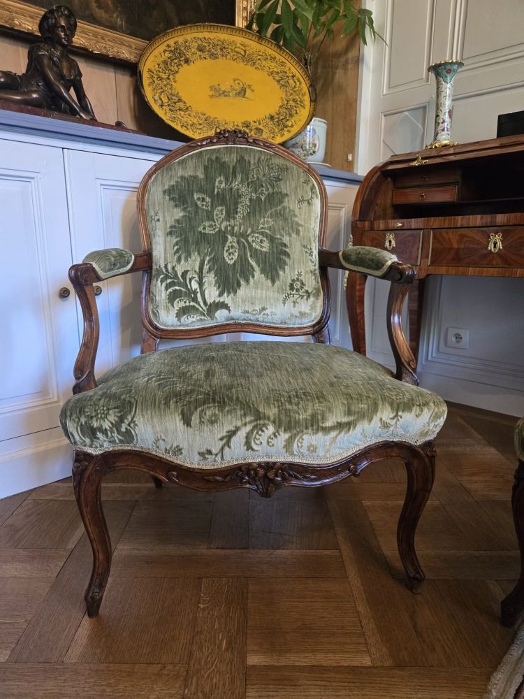 Pair of walnut "à la reine" armchairs, Louis XV period