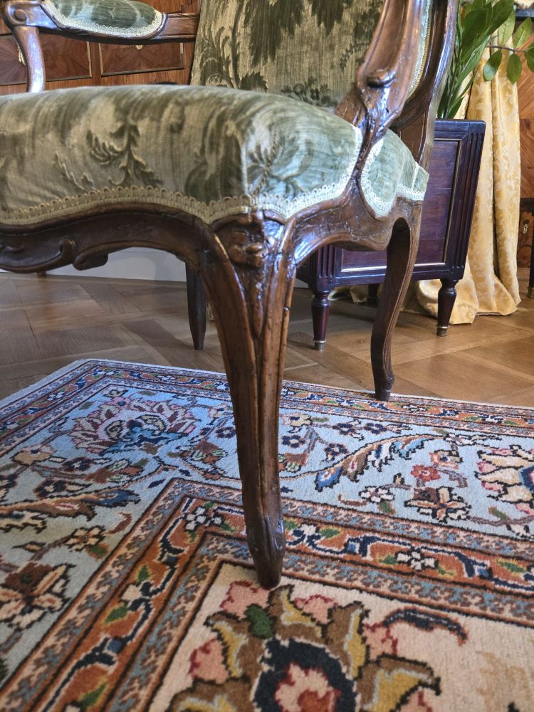 Pair of walnut "à la reine" armchairs, Louis XV period