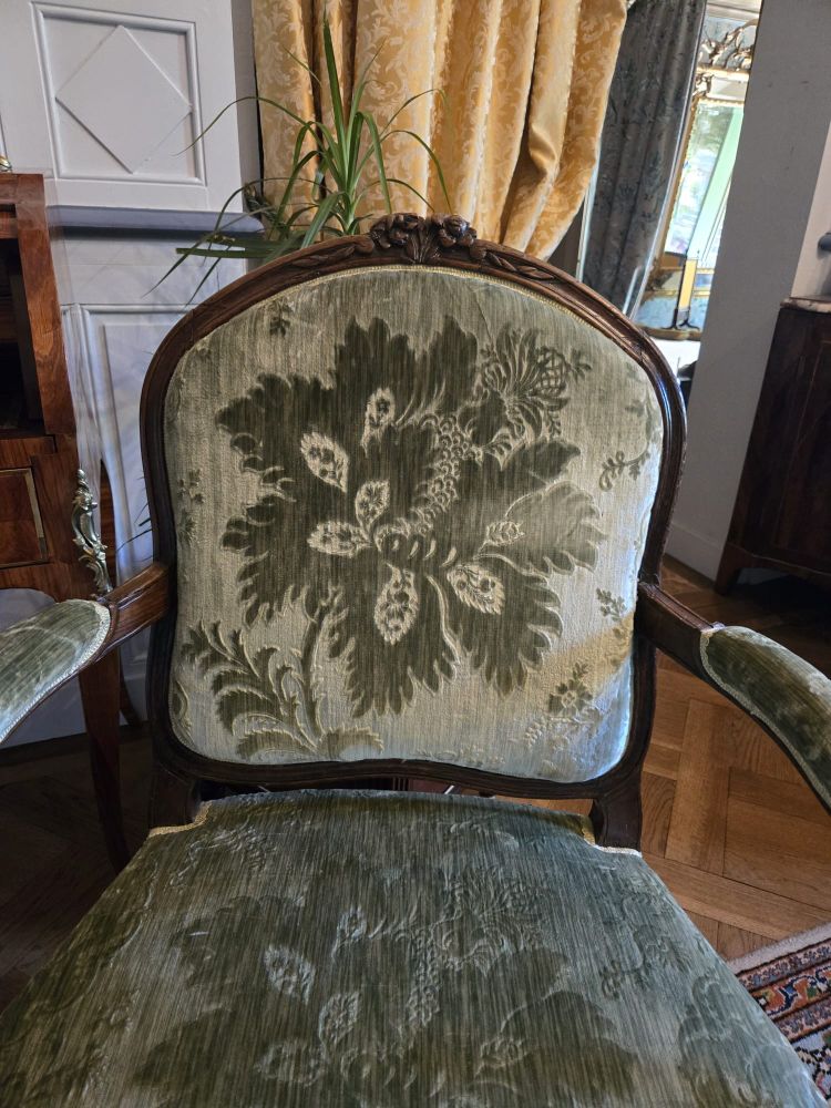 Pair of walnut "à la reine" armchairs, Louis XV period