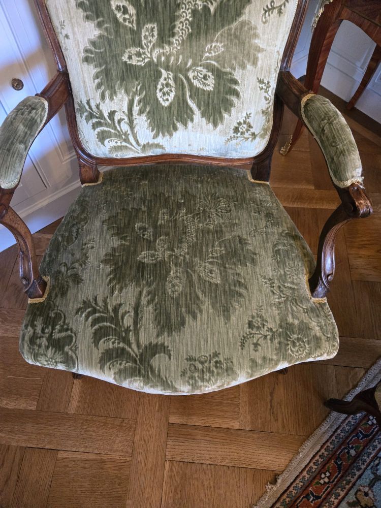 Pair of walnut "à la reine" armchairs, Louis XV period
