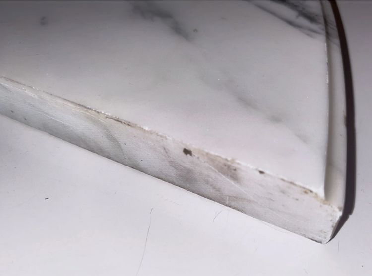 Louis XVI style floating half-moon console with marble top and chased brass structure