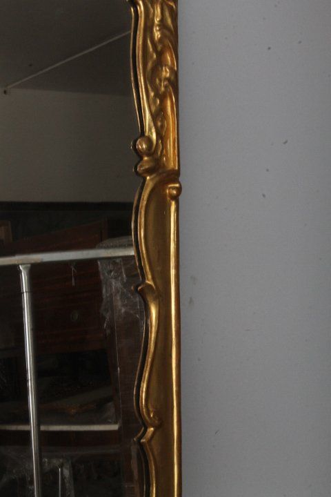 Paire de miroirs anciens Louis XVI 1750 en or pur. Dimensions 124 x 70 cm