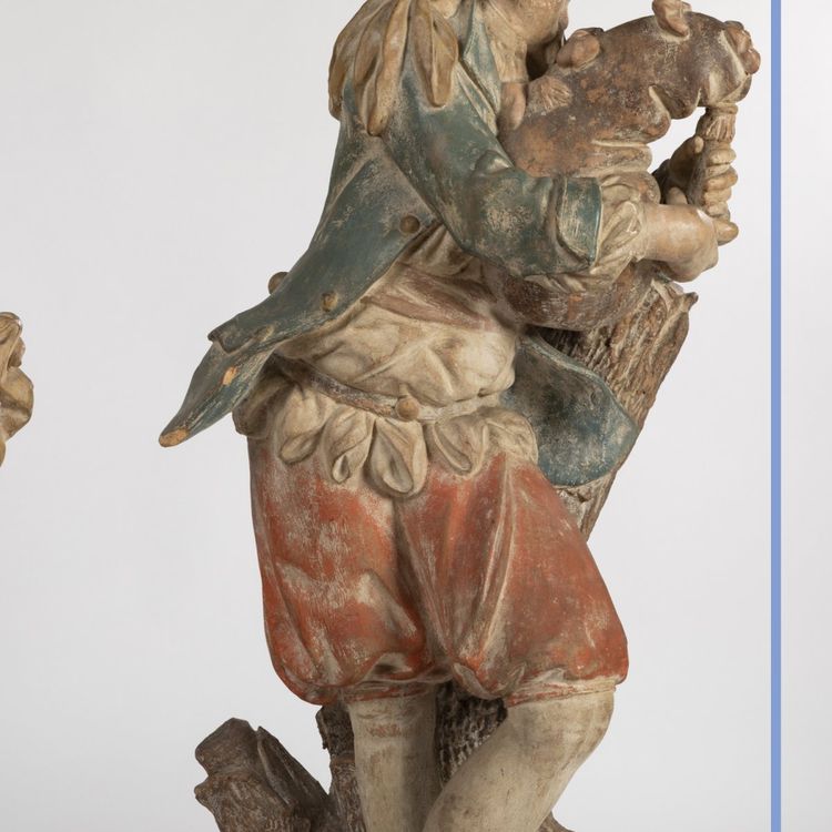 Paire de sculptures en terre cuite sur deux colonnes en bois peint en trompe-l'oeil, XIXe