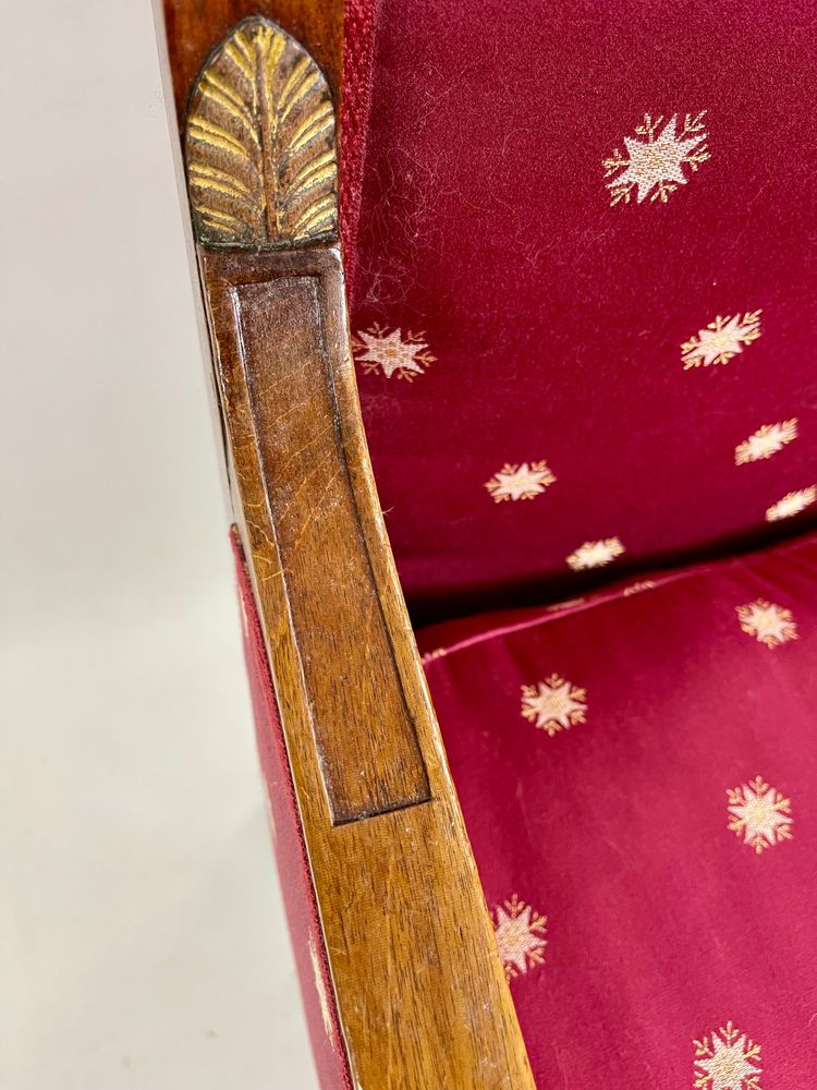 Empire-style square armchair with carved Egyptian figures, attributable to a Paris workshop