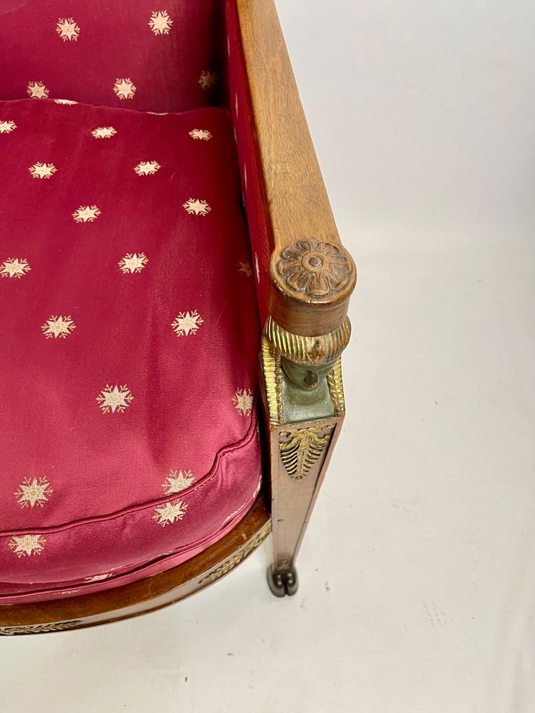 Empire-style square armchair with carved Egyptian figures, attributable to a Paris workshop