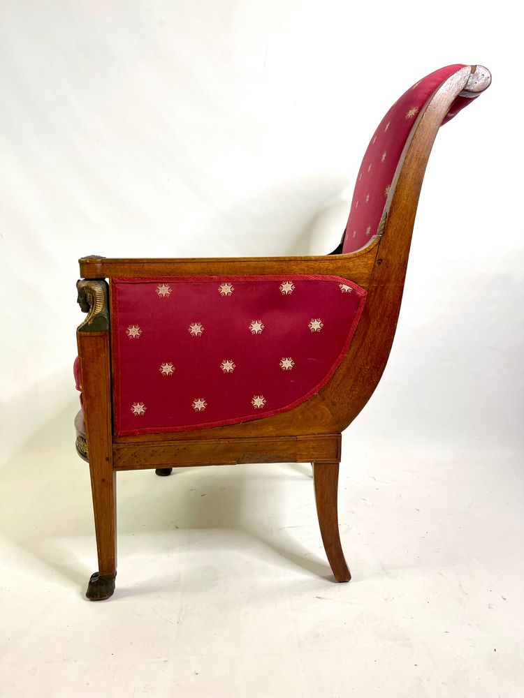 Empire-style square armchair with carved Egyptian figures, attributable to a Paris workshop