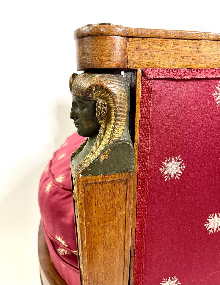 Empire-style square armchair with carved Egyptian figures, attributable to a Paris workshop