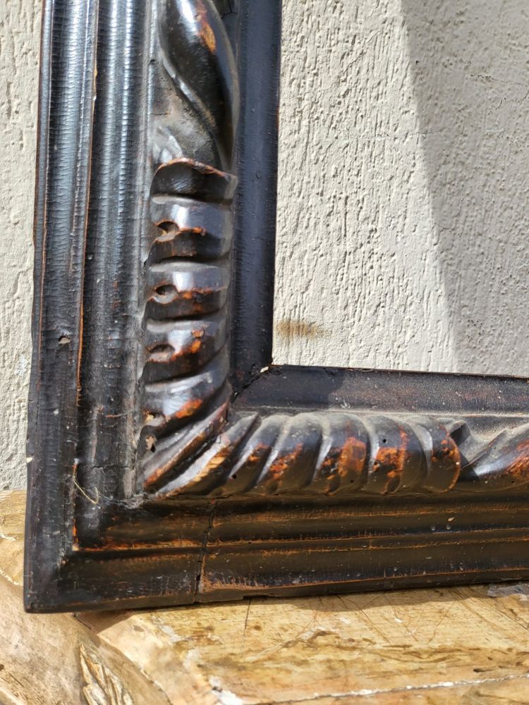 Carved wood frame, 17th century