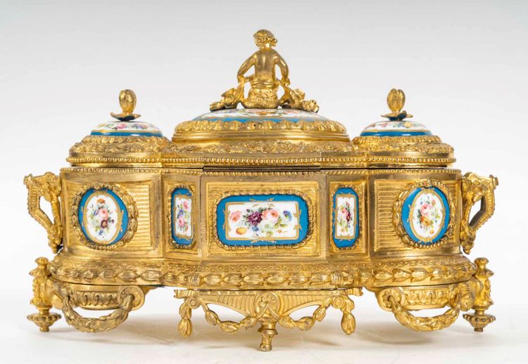A gilt bronze box with Sévres porcelain plates, 19th century