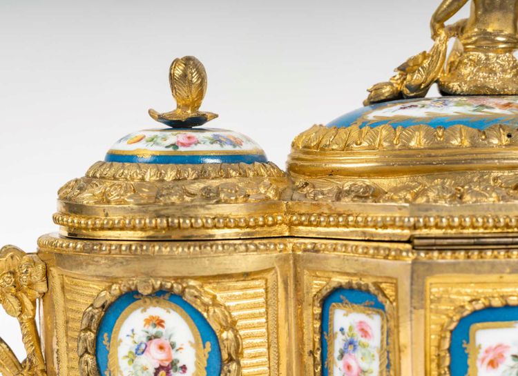A gilt bronze box with Sévres porcelain plates, 19th century