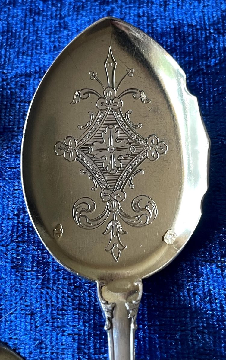 12 Puiforcat ice cream scoops.
