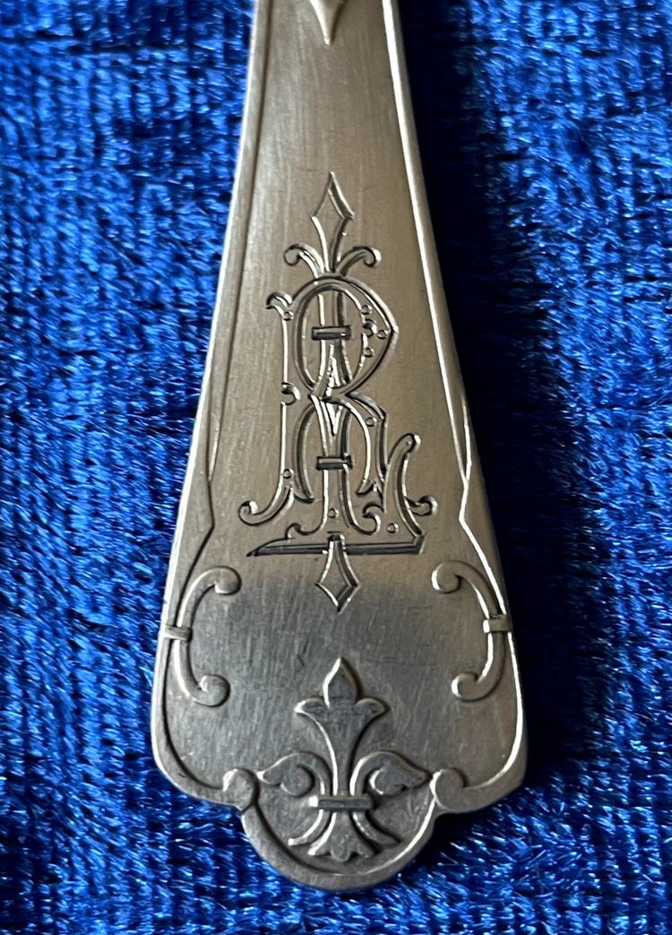 12 Puiforcat ice cream scoops.