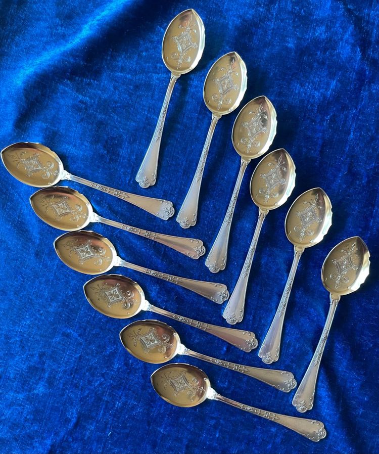12 Puiforcat ice cream scoops.