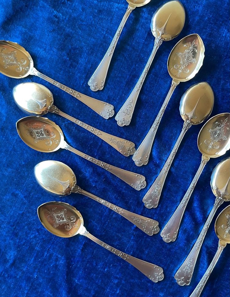 12 Puiforcat ice cream scoops.