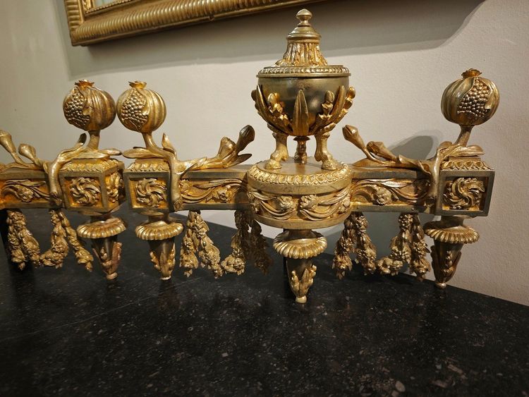 Pair of gilt bronze Chenets with Antique style Pots in the Louis XVI style 19th century