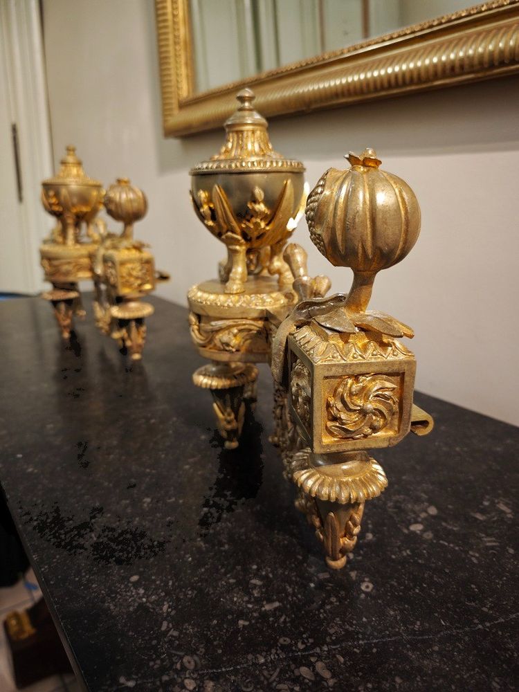 Pair of gilt bronze Chenets with Antique style Pots in the Louis XVI style 19th century
