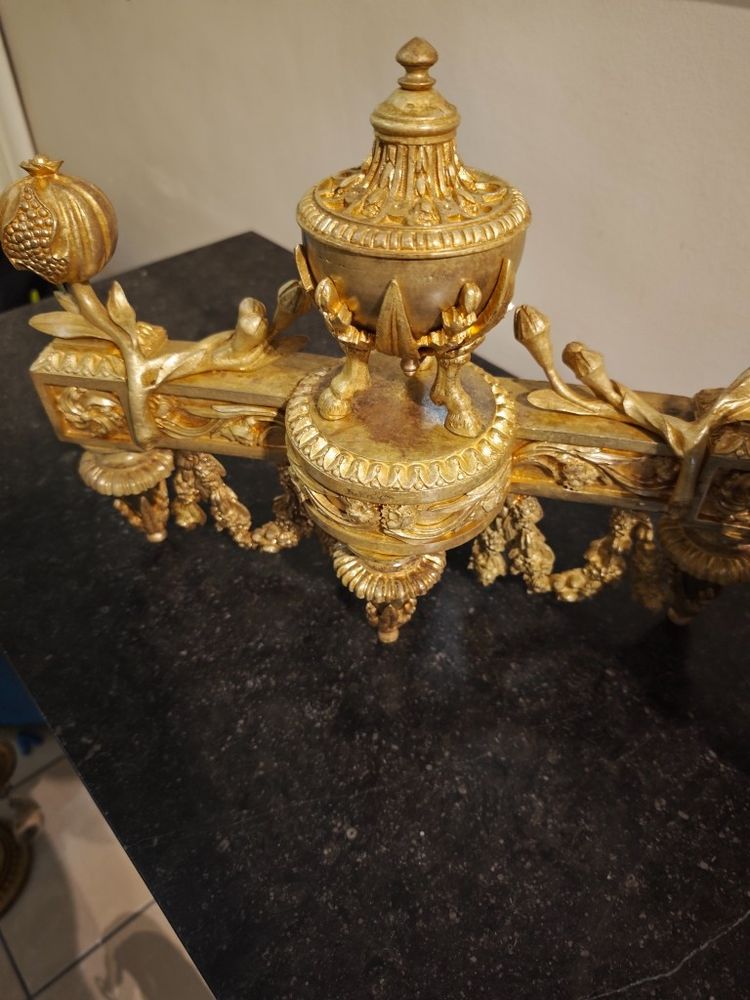 Pair of gilt bronze Chenets with Antique style Pots in the Louis XVI style 19th century